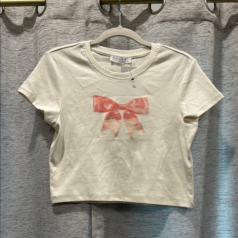 💕2/$10💕Cream Crop Top with Pink Bow Design